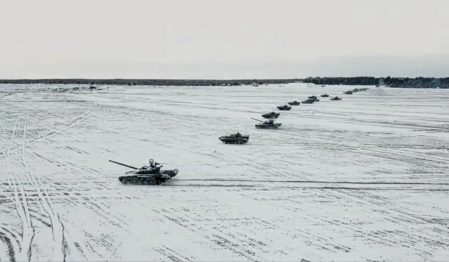 In this photo taken from video and released by the Russian Defense Ministry Press Service on Friday, Feb. 4, 2022, tanks and armored vehicles move during the Belarusian and Russian joint military drills at Brestsky firing range, Belarus. (Russian Defense Ministry Press Service via AP, File)