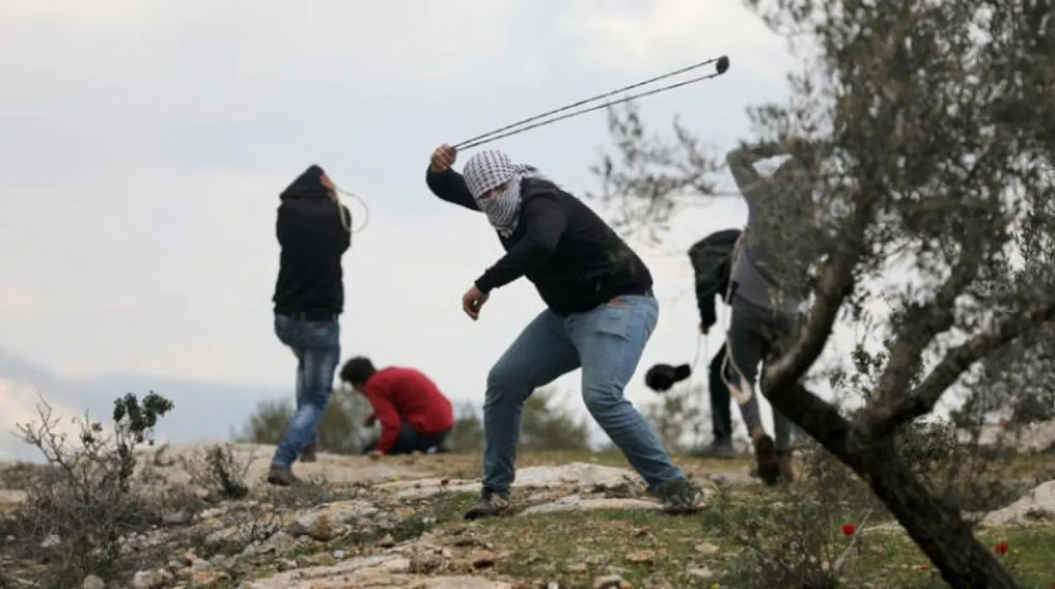 Batı Şeria’nın Nablus kentinde Yahudi yerleşimlerine yönelik protestolara katılan Filistinliler (Reuters)