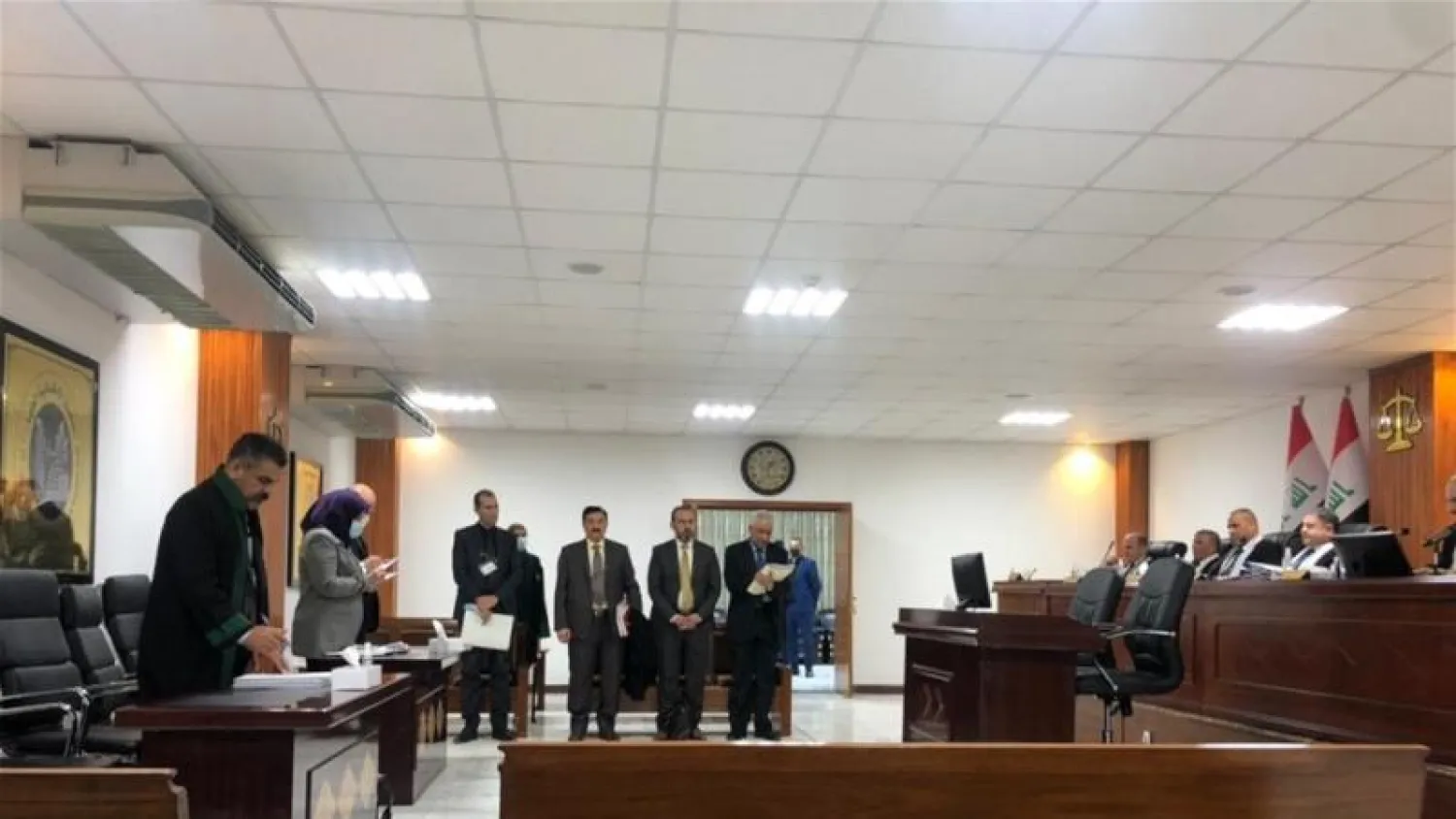 أعضاء من المحكمة الاتحادية العراقية خلال النطق بالحكم (وسائل إعلام عراقية)