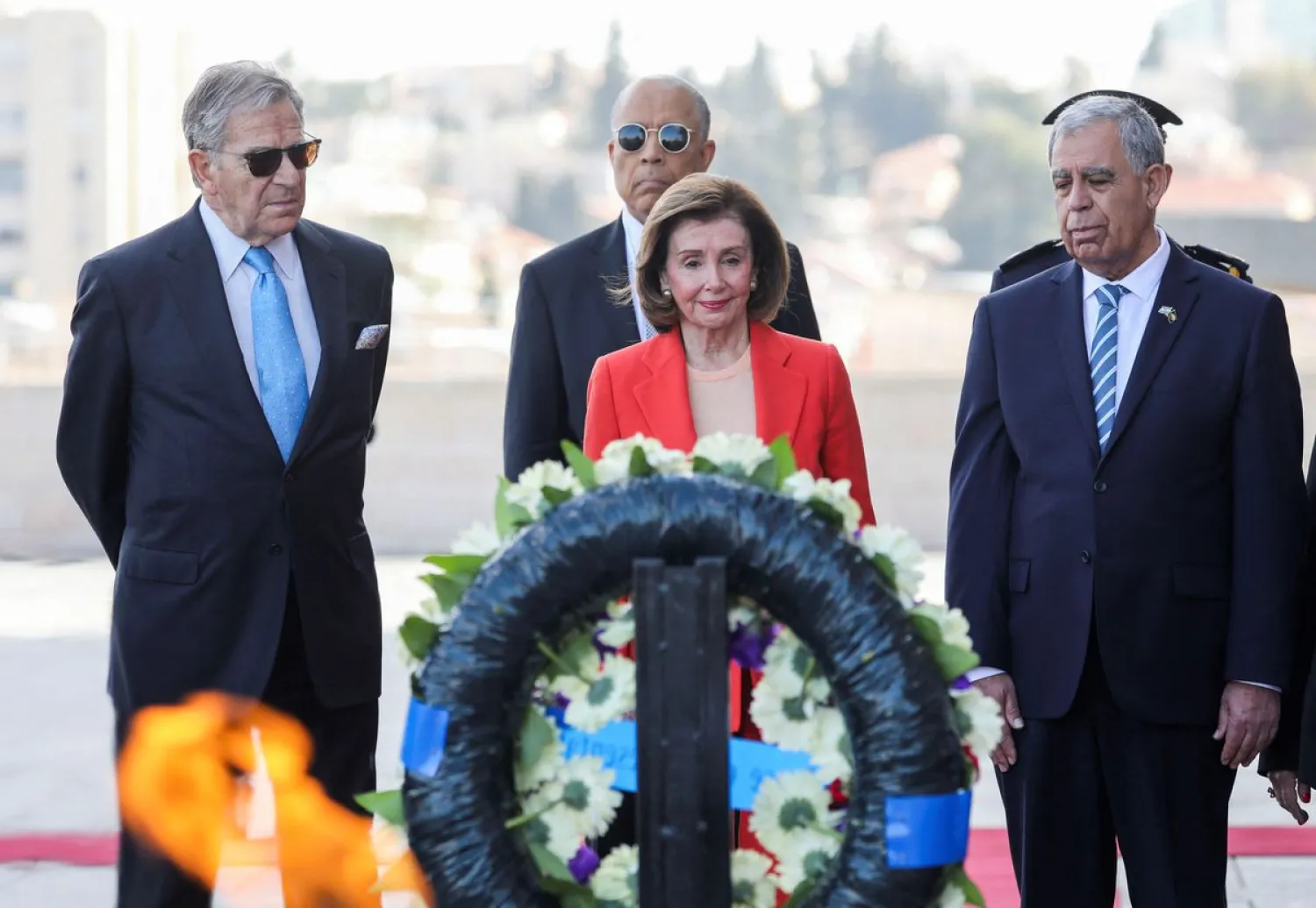 US Speaker of the House of Representatives Nancy Pelosi lays a wreath during an official welcome ceremony at the Knesset, Israel's parliament, in Jerusalem February 16, 2022. Abir Sultan/Pool via REUTERS