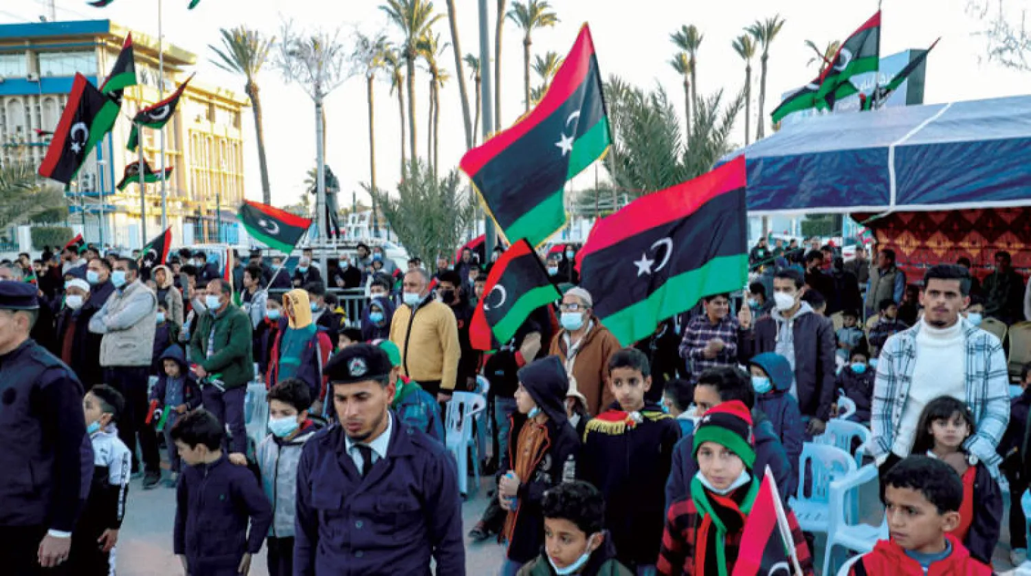 جانب من احتفالات الليبيين بذكرى ثورة فبراير في تاجوراء أمس (أ.ف.ب)
