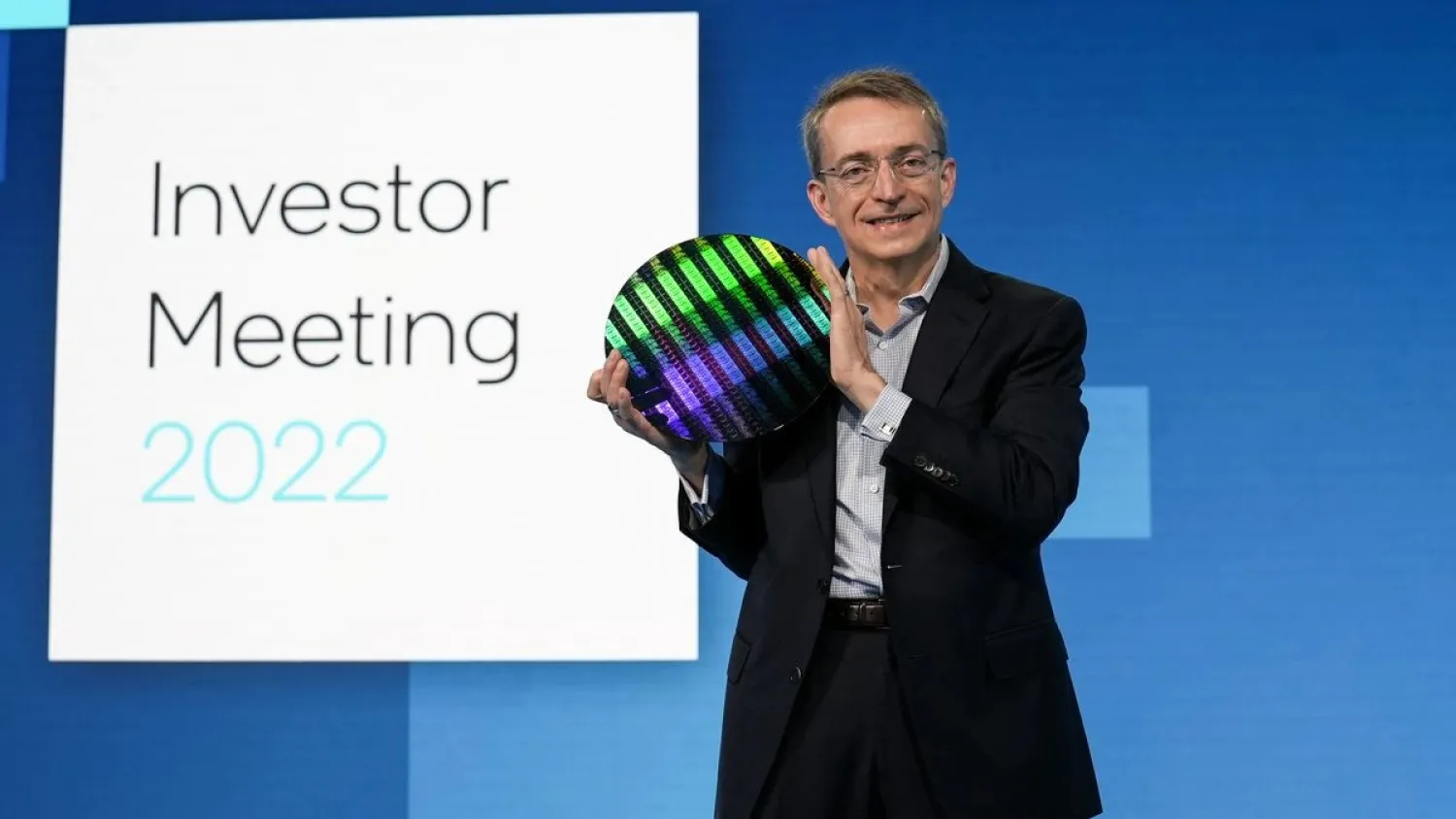 Intel CEO Pat Gelsinger holds a wafer as he speaks on stage at Intel's Investor Day, in San Francisco, California, US, February 17, 2022. (Intel Corporation/Handout via Reuters)
