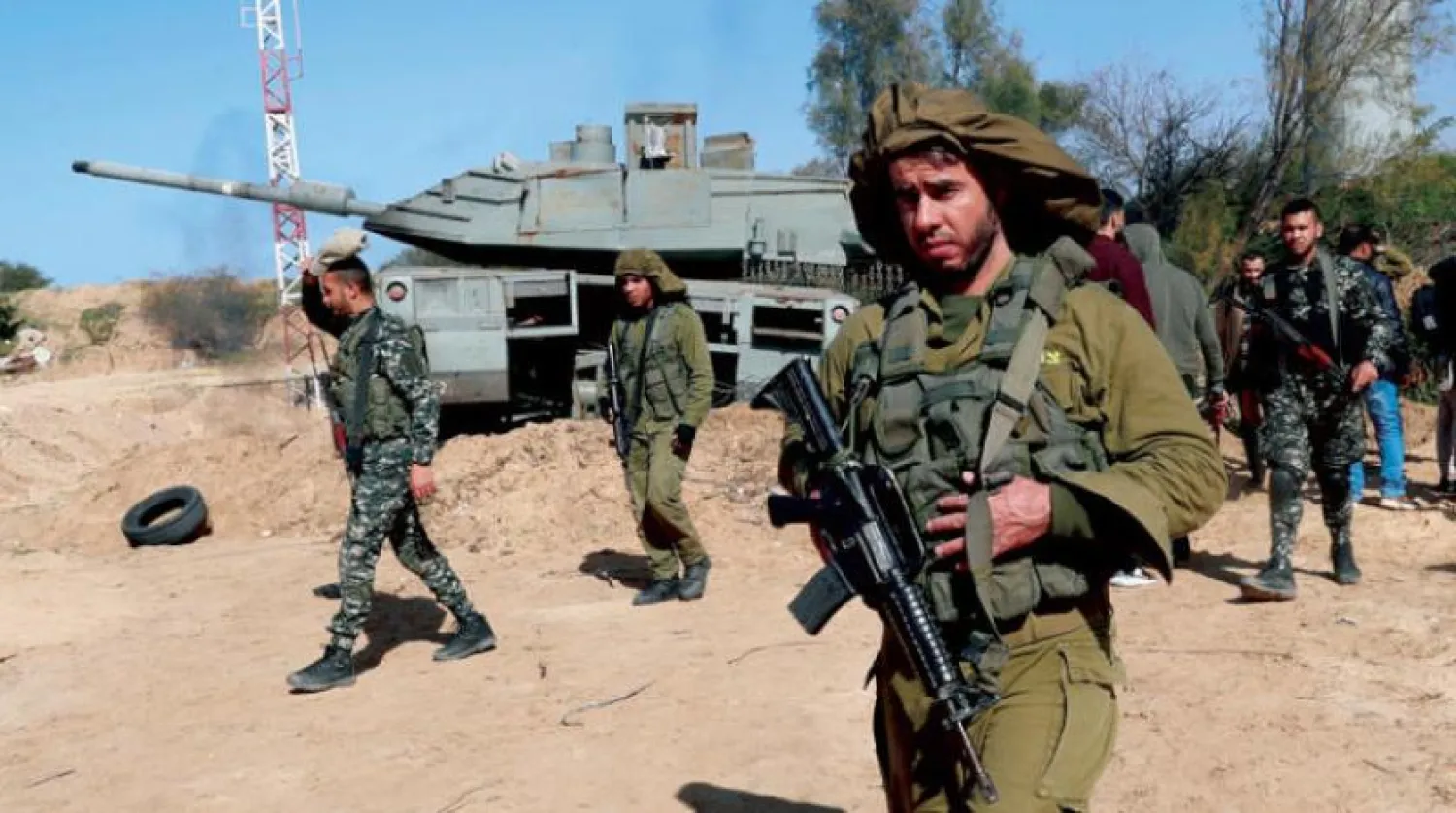 Actors dressed as Israeli soldiers and Hamas fighters appear in a series being filmed in northern Gaza. (AP) 

