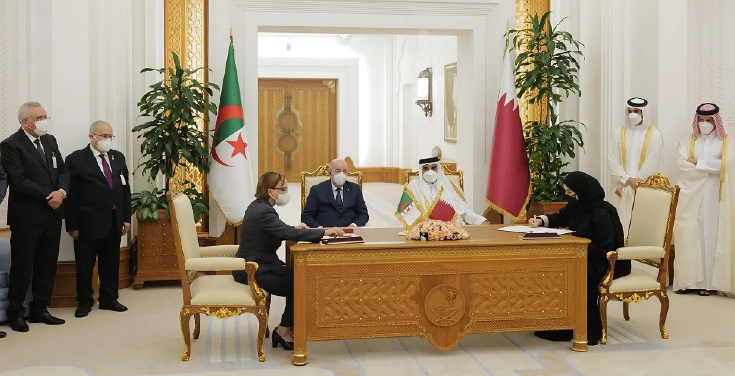 Sheikh Tammim and Tebboune during the singing of the agreements on Sunday. (QNA)