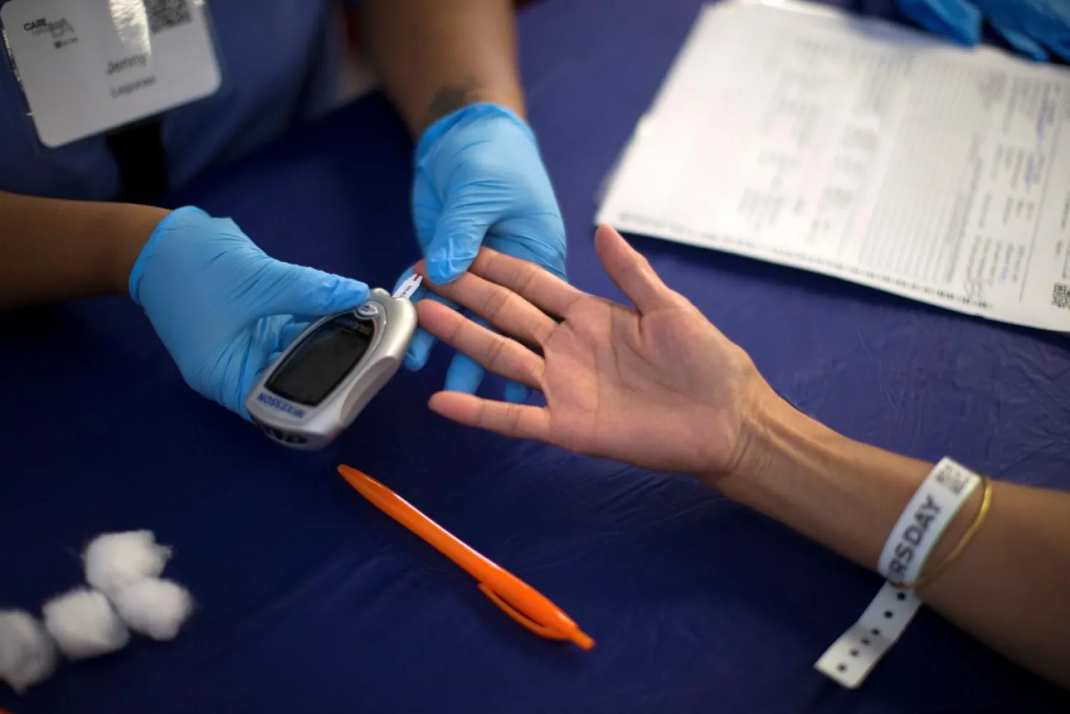 A patient receives a test for diabetes during the Care Harbor LA free medical clinic in Los Angeles, on September 11, 2014. Mario Anzuoni/Reuters
