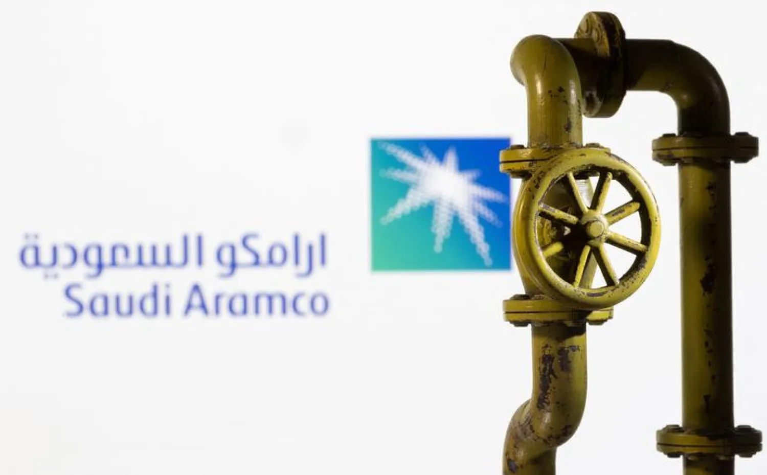 A 3D printed natural gas pipeline is placed in front of displayed Saudi Aramco logo in this illustration taken February 8, 2022. REUTERS/Dado Ruvic/Illustration

