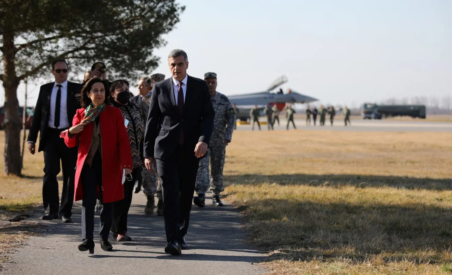 Bulgaria's Defense Minister Stefan Yanev and Spain's Defence Minister Margarita Robles inspect the joint air police activities carried by Bulgarian and Spanish pilots and jets at Graf Ignatievo Air Base, Bulgaria, February 21, 2022. (Reuters)