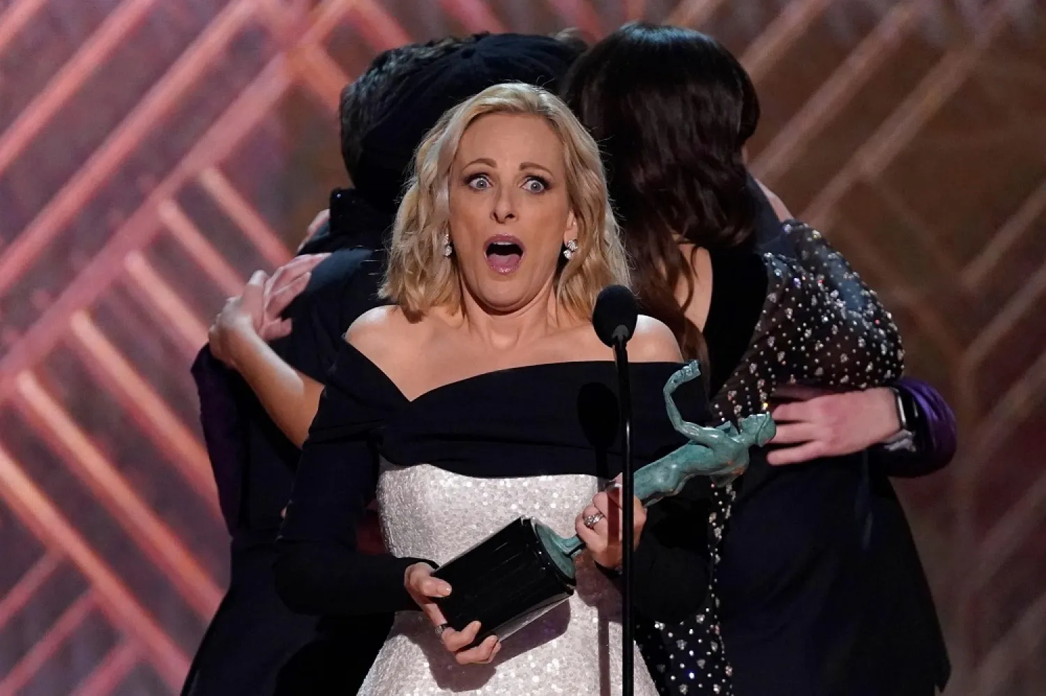 The cast of "CODA" reacts after their win. (AP)