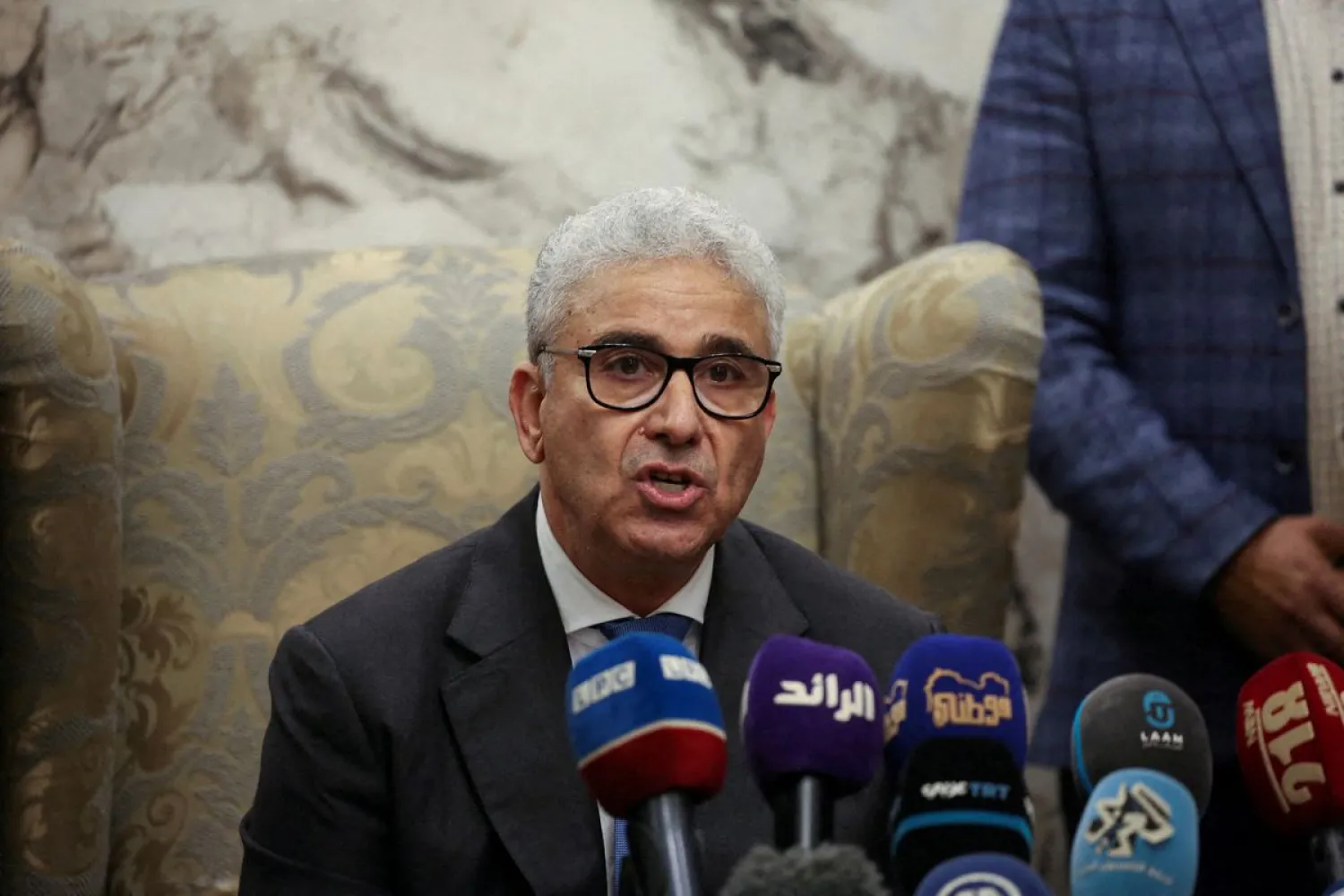 Fathi Bashagha, designated as prime minister by the parliament, delivers a speech at Mitiga International Airport, in Tripoli, Libya February 10, 2022. Picture taken February 10, 2022. (Reuters)