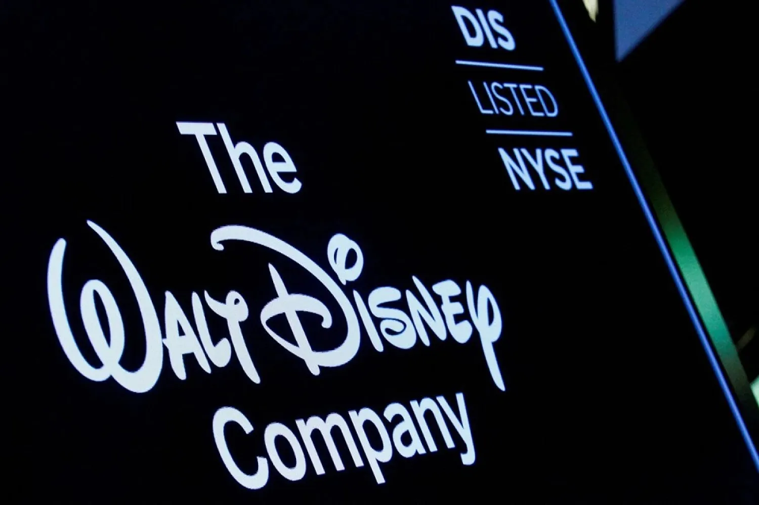 A screen shows the logo and a ticker symbol for The Walt Disney Company on the floor of the New York Stock Exchange (NYSE) in New York, US, December 14, 2017. (Reuters)