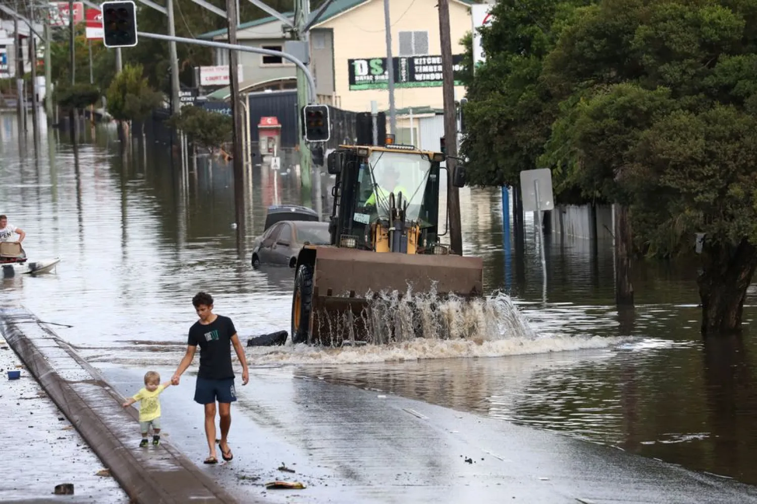 A view of a flooded road following heavy rains in Lismore, New South Wales, Australia March 2, 2022. AAP Image/Jason O'Brien via REUTERS

