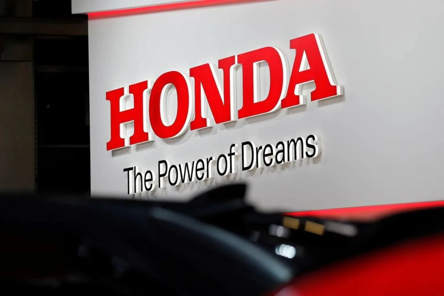 A Honda logo is seen on media day at the Paris auto show, in Paris, France, September 29, 2016. (Reuters)