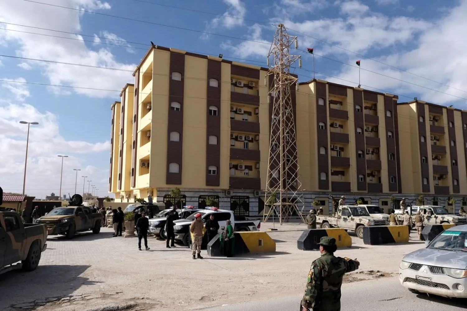Security forces stand guard outside the Parliament building, in Tobruk, Libya, February 10, 2022 (Reuters)
