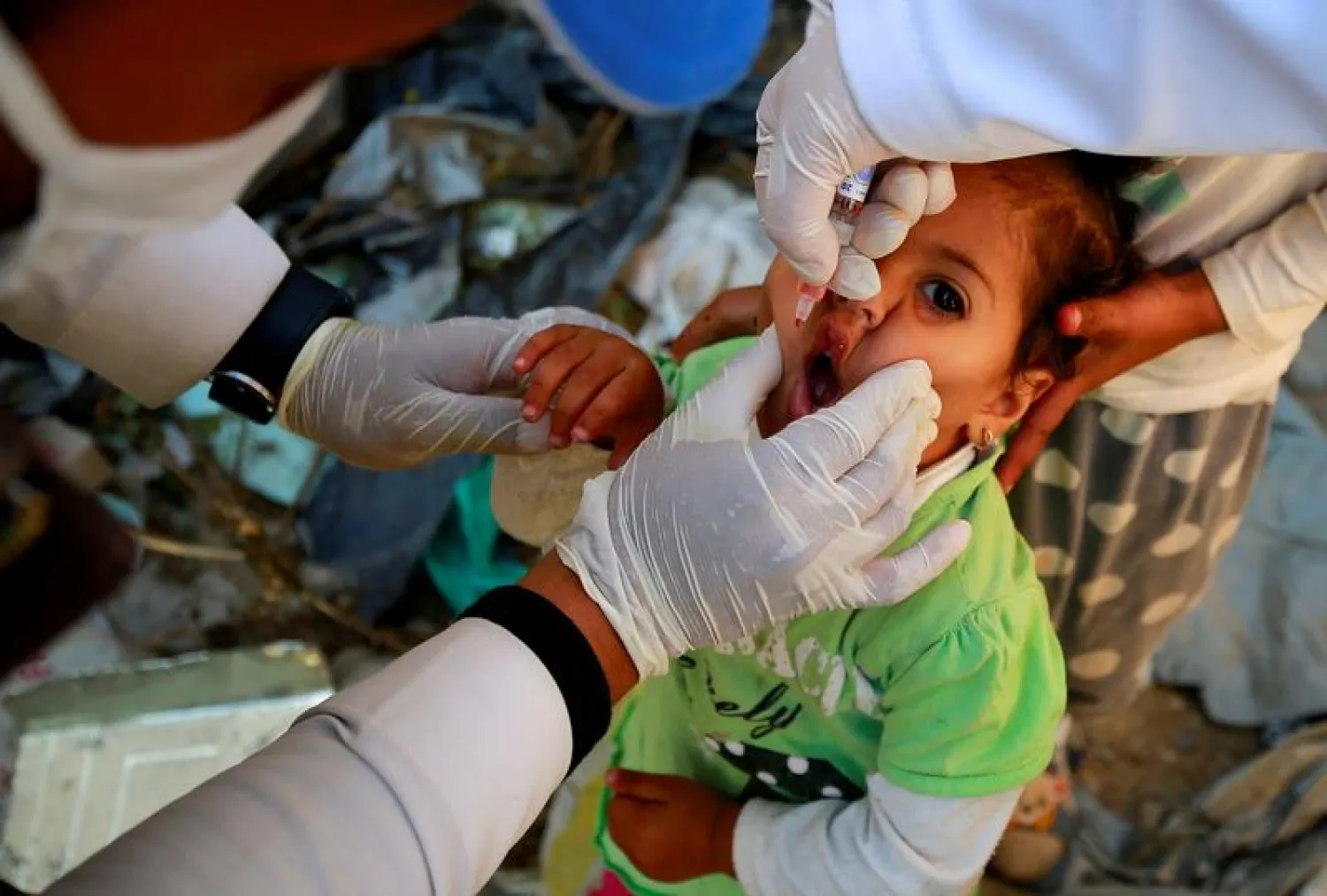 A girl receives polio vaccine in Sanaa, Yemen (file photo: Reuters)
