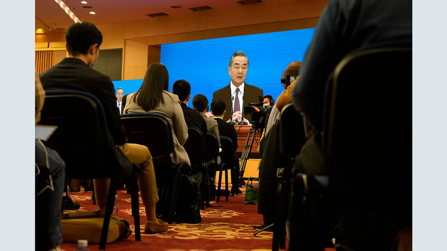 Chinese Foreign Minister Wang Yi speaks during a remote video press conference held on the sidelines of the annual meeting of China's National People's Congress (NPC) in Beijing, Monday, March 7, 2022. (AP Photo/Sam McNeil)
