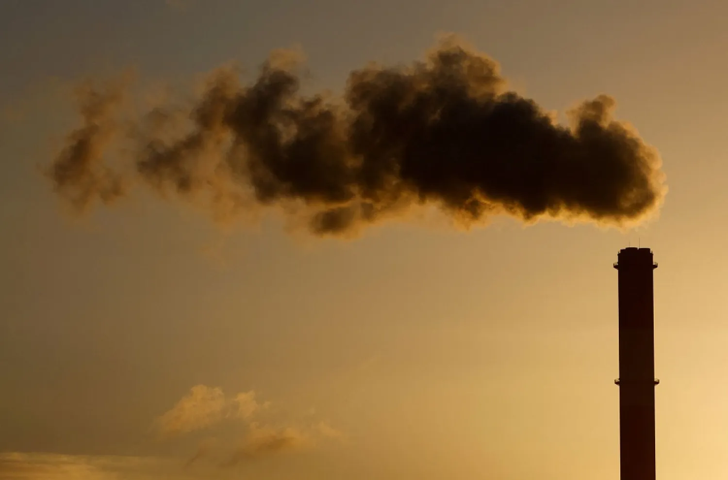 A view shows emissions from the smoke stack of the Electricite de France (EDF) coal-fired power plant in Cordemais near Nantes, France, January 20, 2022. (Reuters)