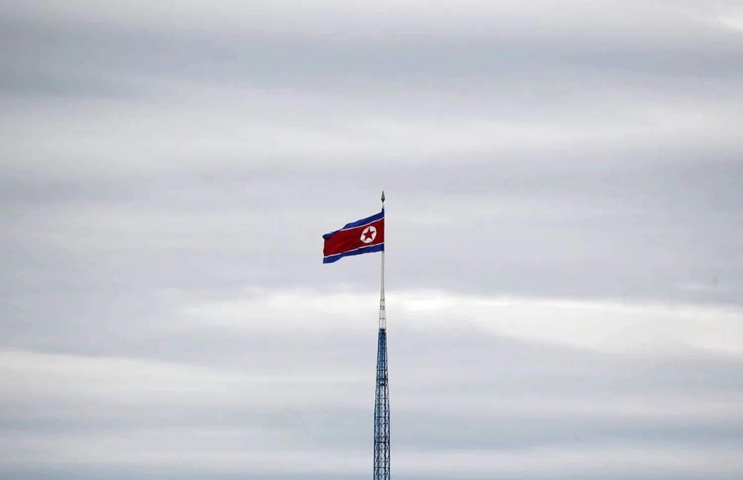 A North Korean flag flutters on top of a 160-metre tower in North Korea's propaganda village of Gijungdong, in this picture taken from the Tae Sung freedom village near the Military Demarcation Line (MDL), inside the demilitarized zone separating the two Koreas, in Paju, South Korea, April 24, 2018. (Reuters)