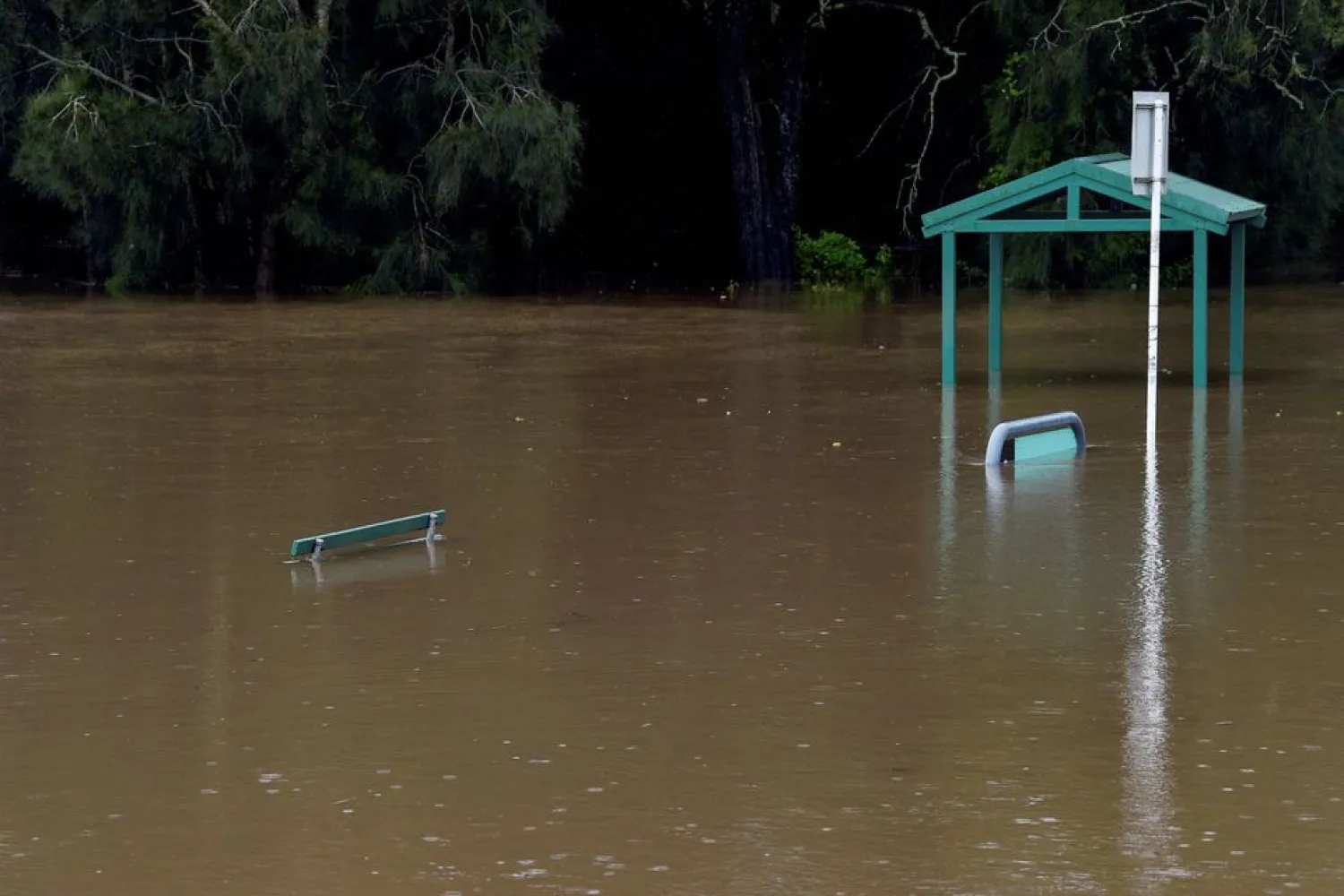 Kelso Beach Reserve is submerged by floodwater after the Georges River burst its banks in East Hills, south-west of Sydney, Australia, March 8, 2022. (Reuters)