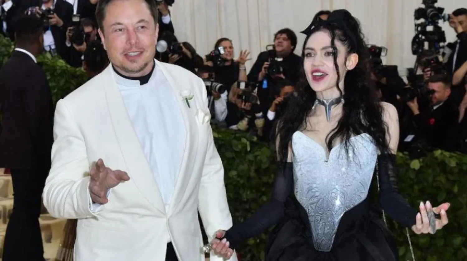 Elon Musk ve Grimes  (AFP)
