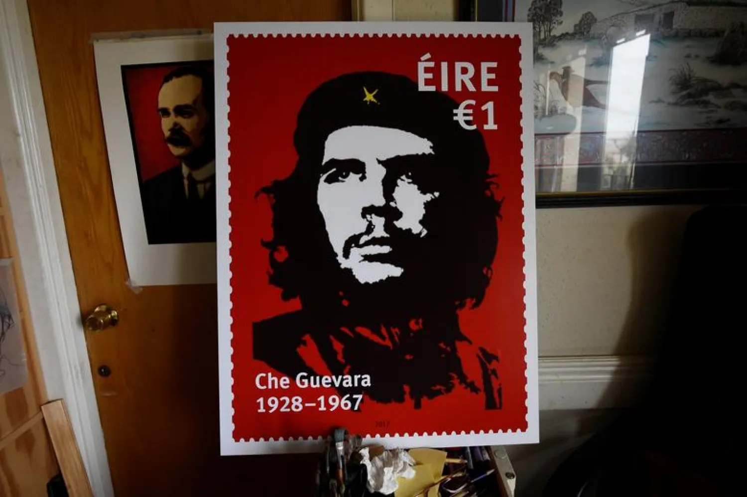 Artist Jim Fitzpatrick who has created an Irish postage stamp using the poster of Che Guevara he created in 1968 entitled 'Viva Che!' based on a photograph by Alberto Korda poses for a picture at his studio in Dublin, Ireland October 11, 2017. REUTERS/Clodagh Kilcoyne
