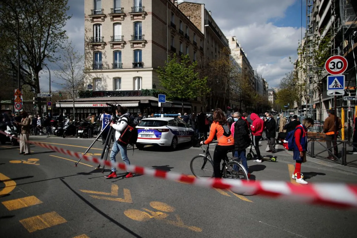 French police secure the area after one person was shot dead and one injured in front of the Henry Dunant hospital in Paris, France, April 12, 2021. REUTERS/Benoit Tessier