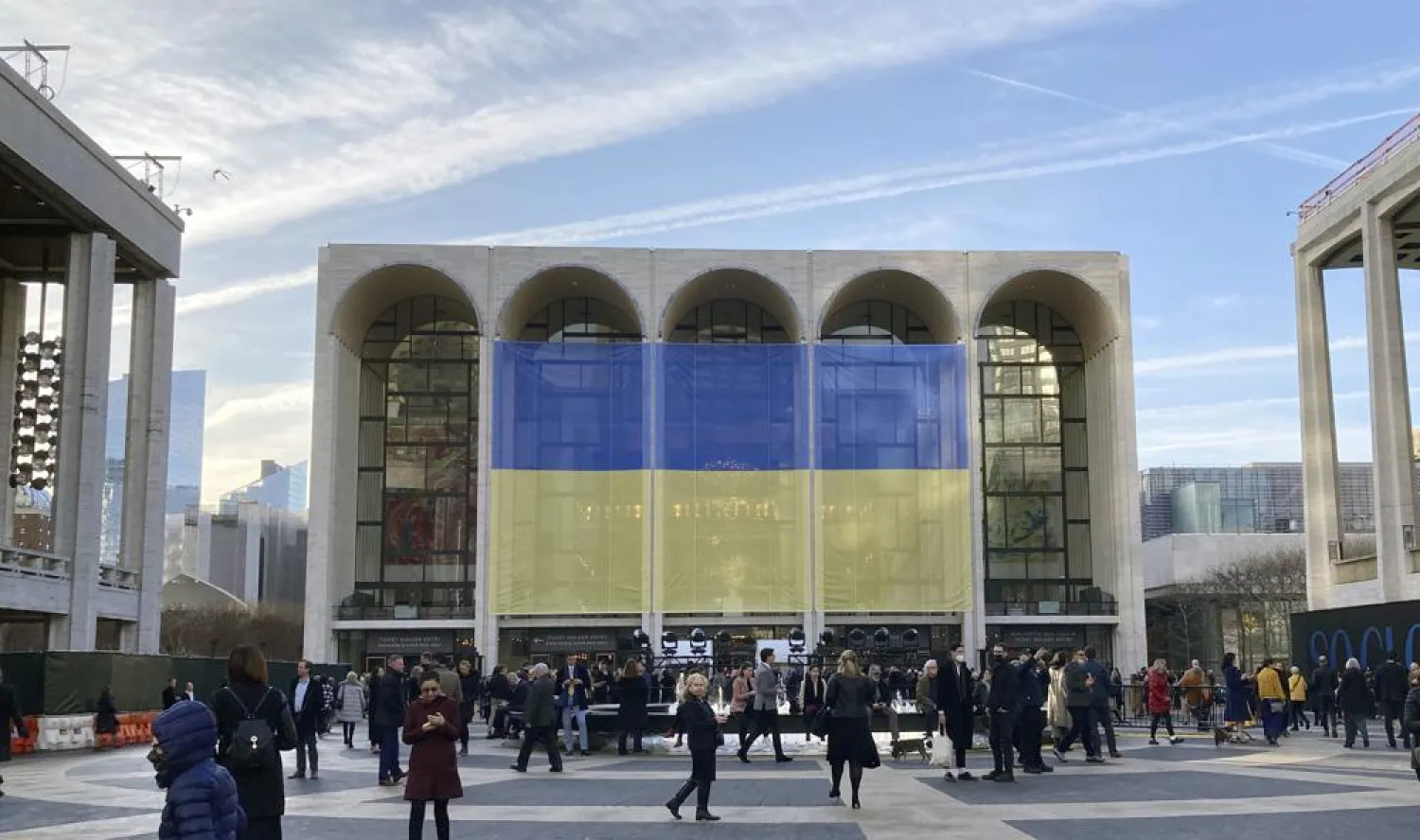 Ukraine's flag is draped outside The Metropolitan Opera House at Lincoln Center for the Performing Arts in New York before a benefit for Ukraine concert, Monday, March 14, 2022. (AP)