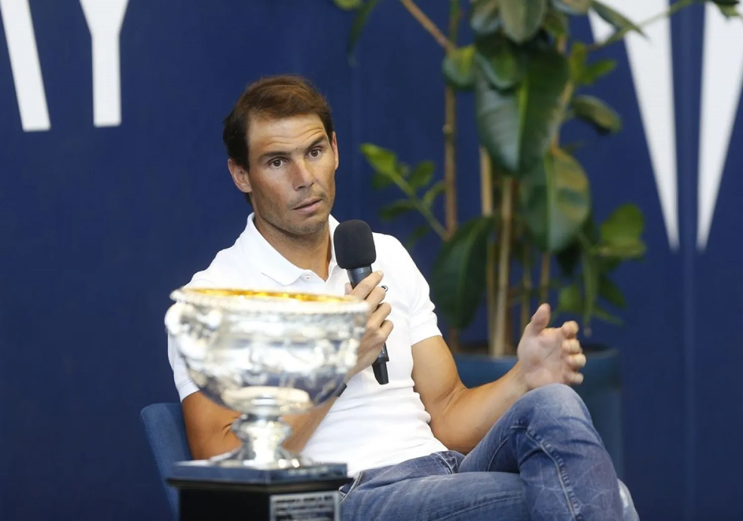 Spain's Rafael Nadal with the Australian Open trophy during a press conference at the Rafa Nadal Academy, Mallorca, Spain, February 2, 2022. (Reuters)