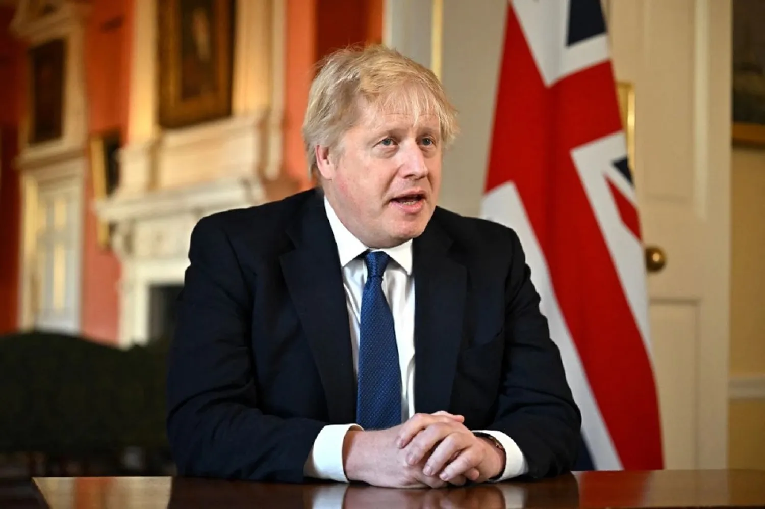 British Prime Minister Boris Johnson records an address at Downing Street after he chaired an emergency Cobra meeting to discuss the UK response to the Russian invasion of Ukraine, in London, Britain February 24, 2022. (Reuters)