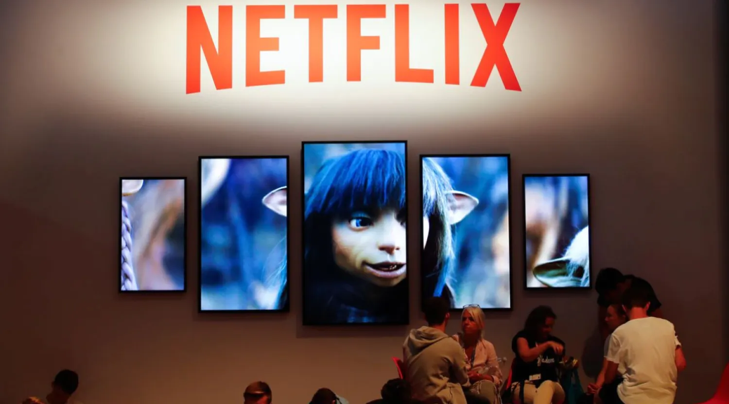 Gamers and visitors rest at the booth of Netflix during Europe's leading digital games fair Gamescom in Cologne, Germany, August 21, 2019. REUTERS/Wolfgang Rattay
