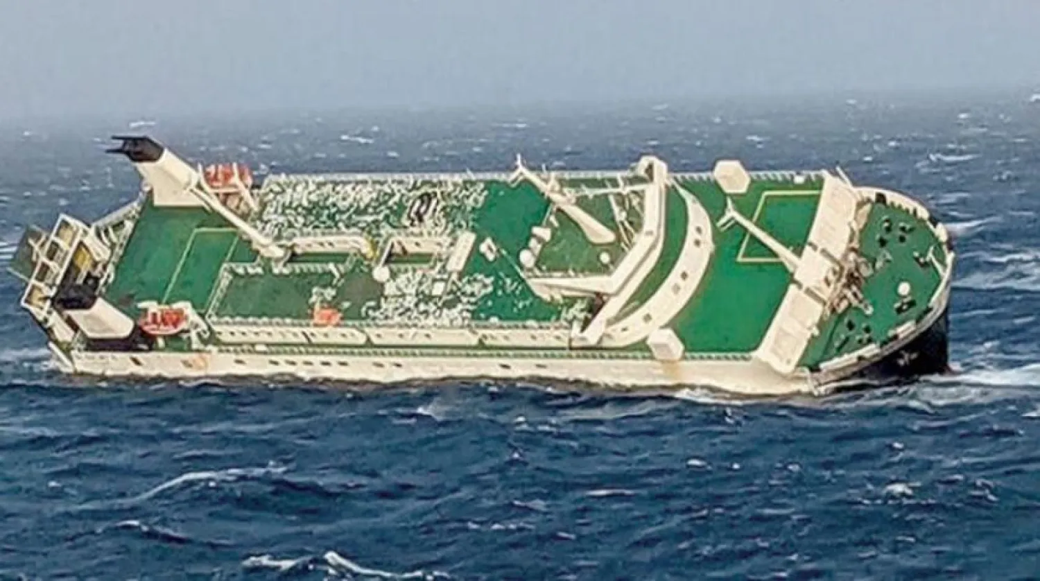  A picture released by the Ports and Maritime Organization of Iran shows the Emirati cargo ship capsized in Gulf waters off the Iranian port of Asalouyeh – (Ports and Maritime Organization of Iran/AFP) 
