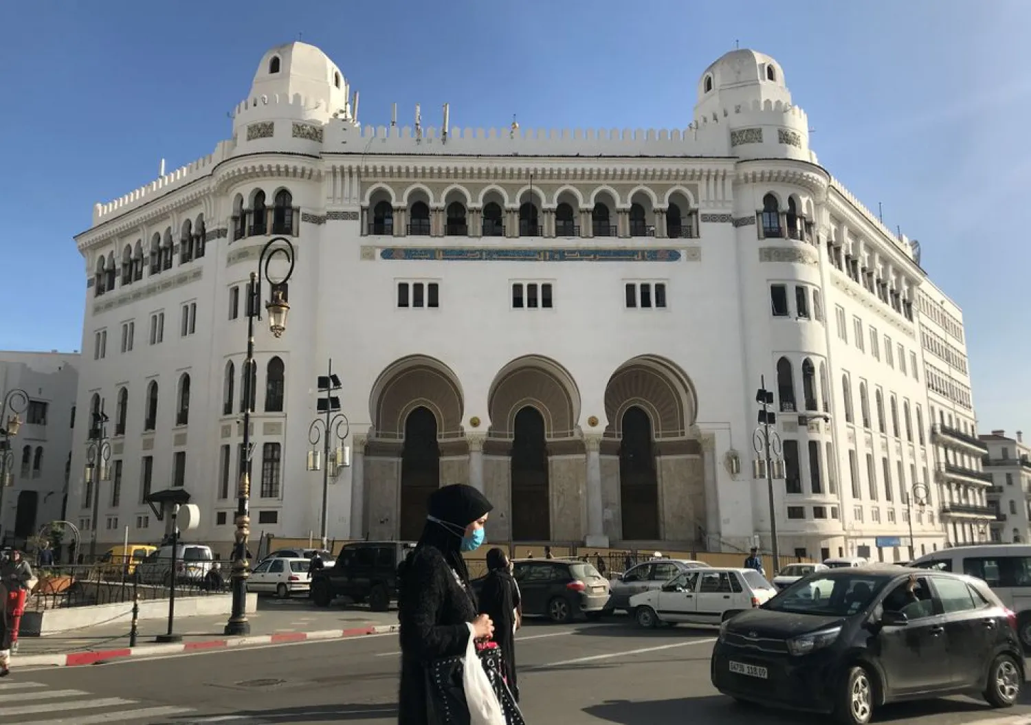 A woman walks on a street in Algiers, Algeria, December 17, 2020. (Reuters)