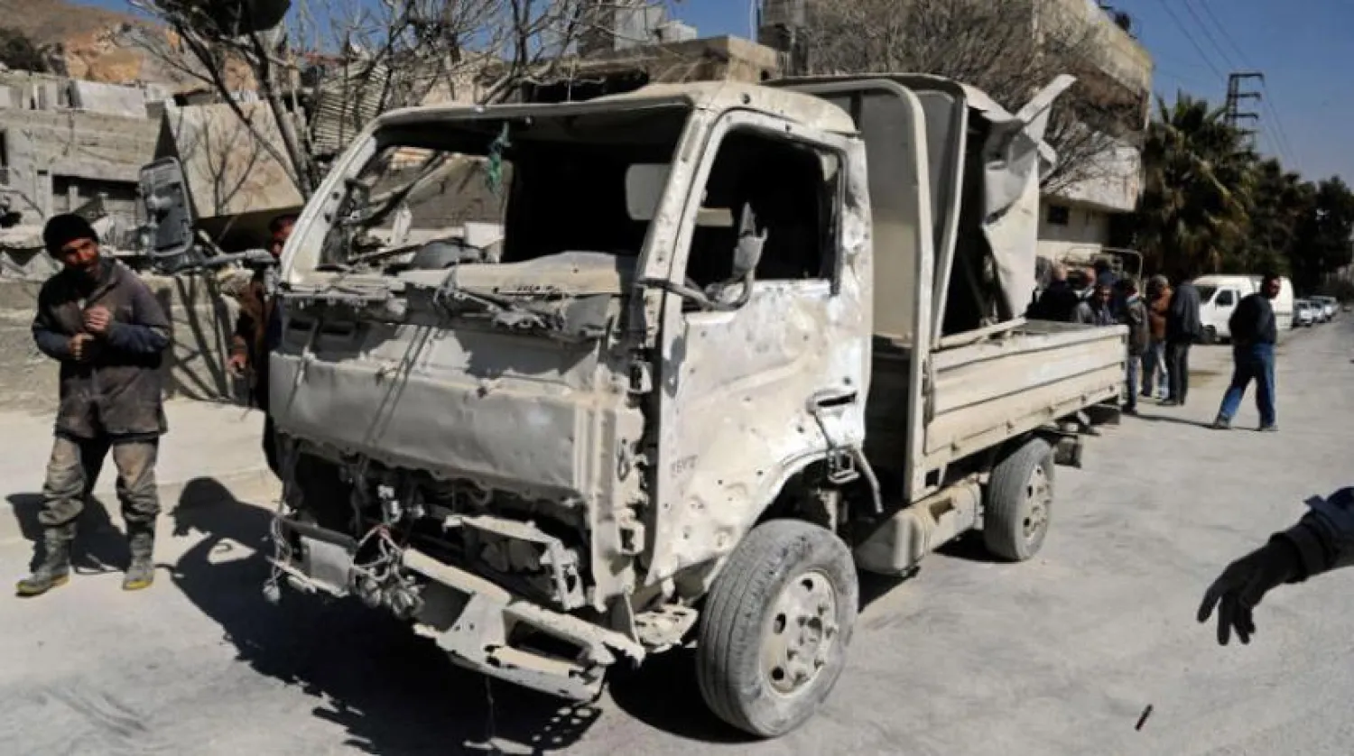 A transport vehicle was destroyed after an Israeli bombardment on Damascus countryside (AP)