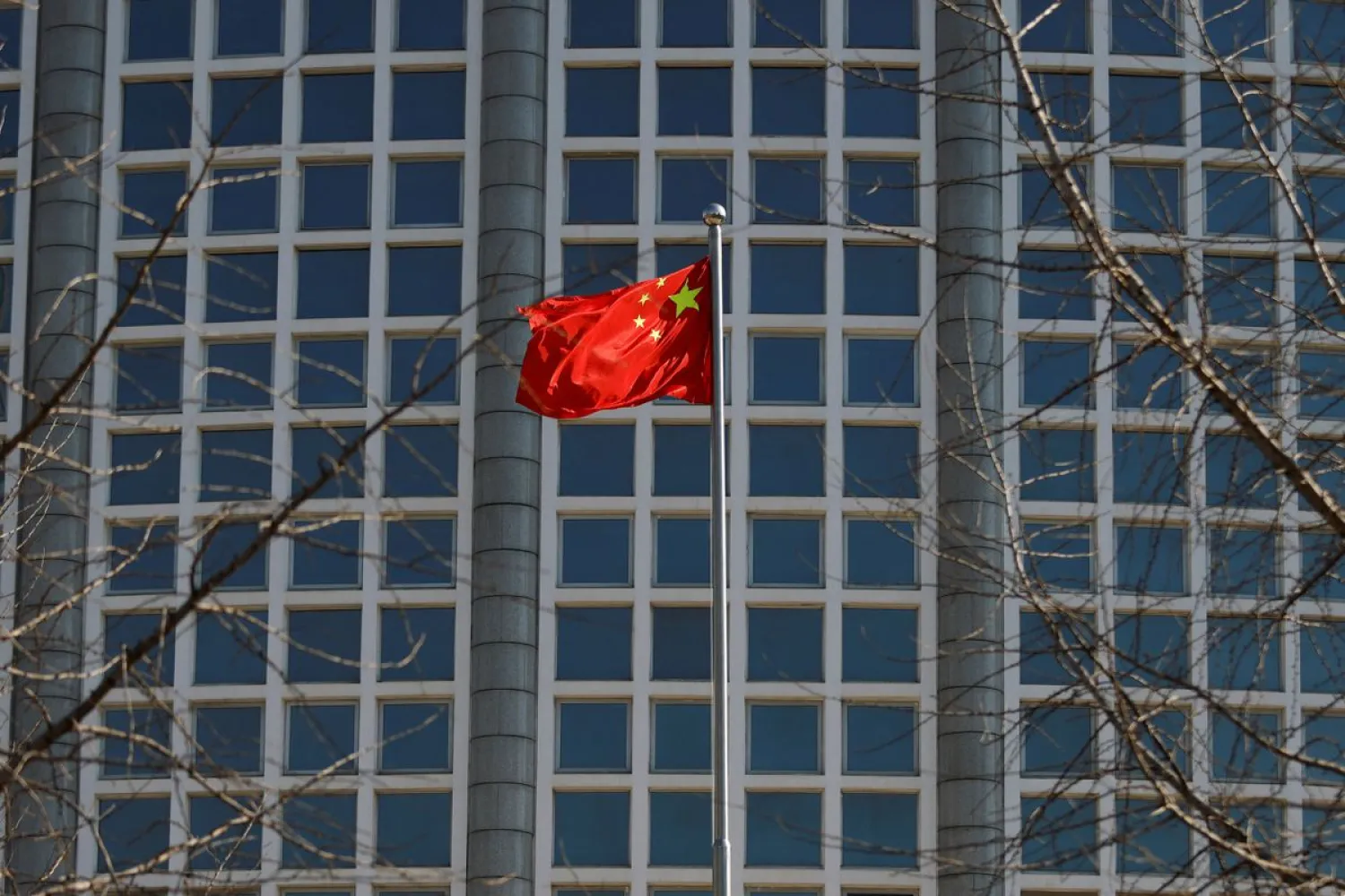 A Chinese flag flutters outside the Chinese foreign ministry in Beijing, China February 24, 2022. (Reuters)
