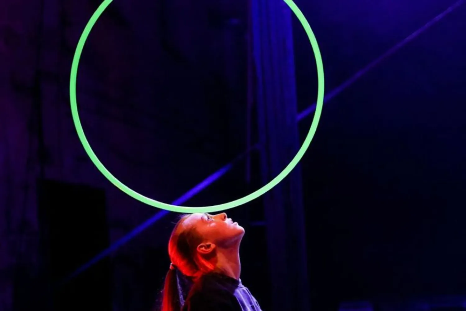 A girl rehearses, as Ukrainian students from the Kyiv Municipal Academy of Performing and Circus Arts and members of Czech Cirk La Putyka contemporary circus company rehearse, before a joint performance in Prague, Czech Republic, March 21, 2022. (Reuters)