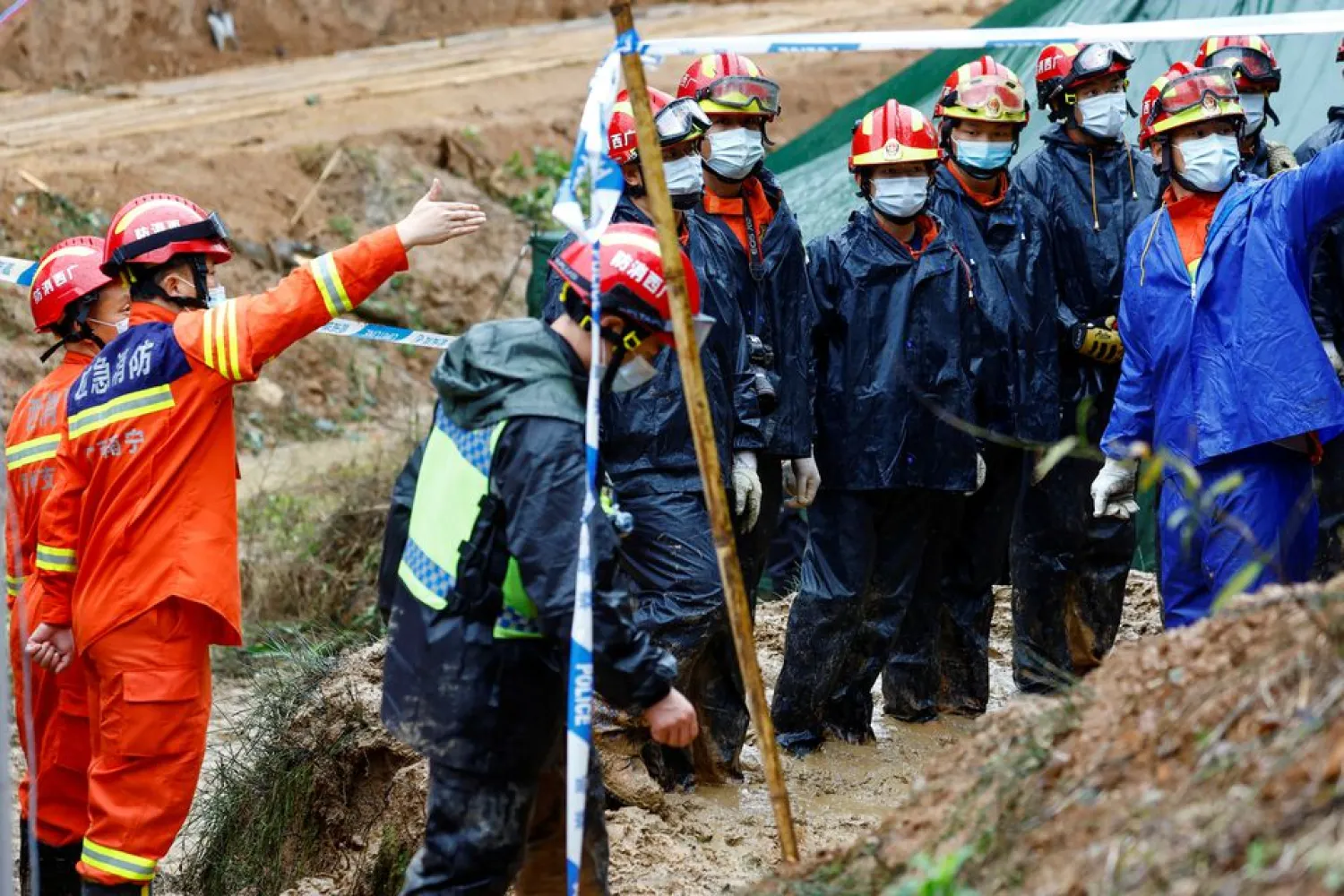 Rescue workers work at the site where a China Eastern Airlines Boeing 737-800 plane flying from Kunming to Guangzhou crashed, in Wuzhou, Guangxi Zhuang Autonomous Region, China March 24, 2022. (Reuters)