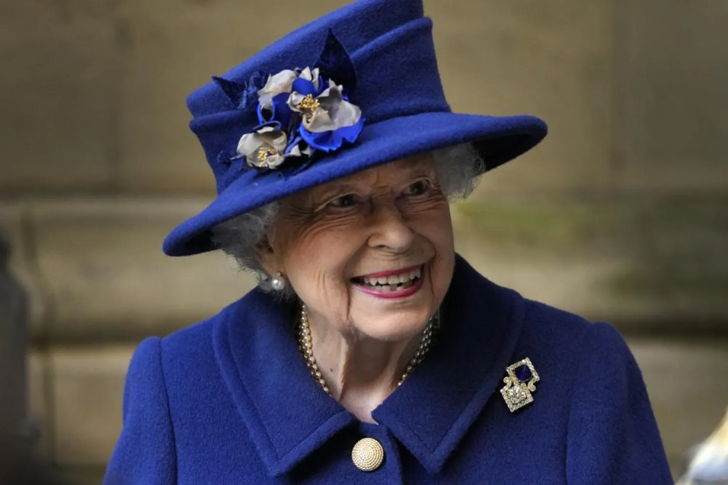 FILE - In this Tuesday, Oct. 12, 2021 file photo, Britain's Queen Elizabeth II, Patron, leaves after attending a Service of Thanksgiving to mark the Centenary of the Royal British Legion at Westminster Abbey in London. (AP Photo/Frank Augstein, Pool, File)