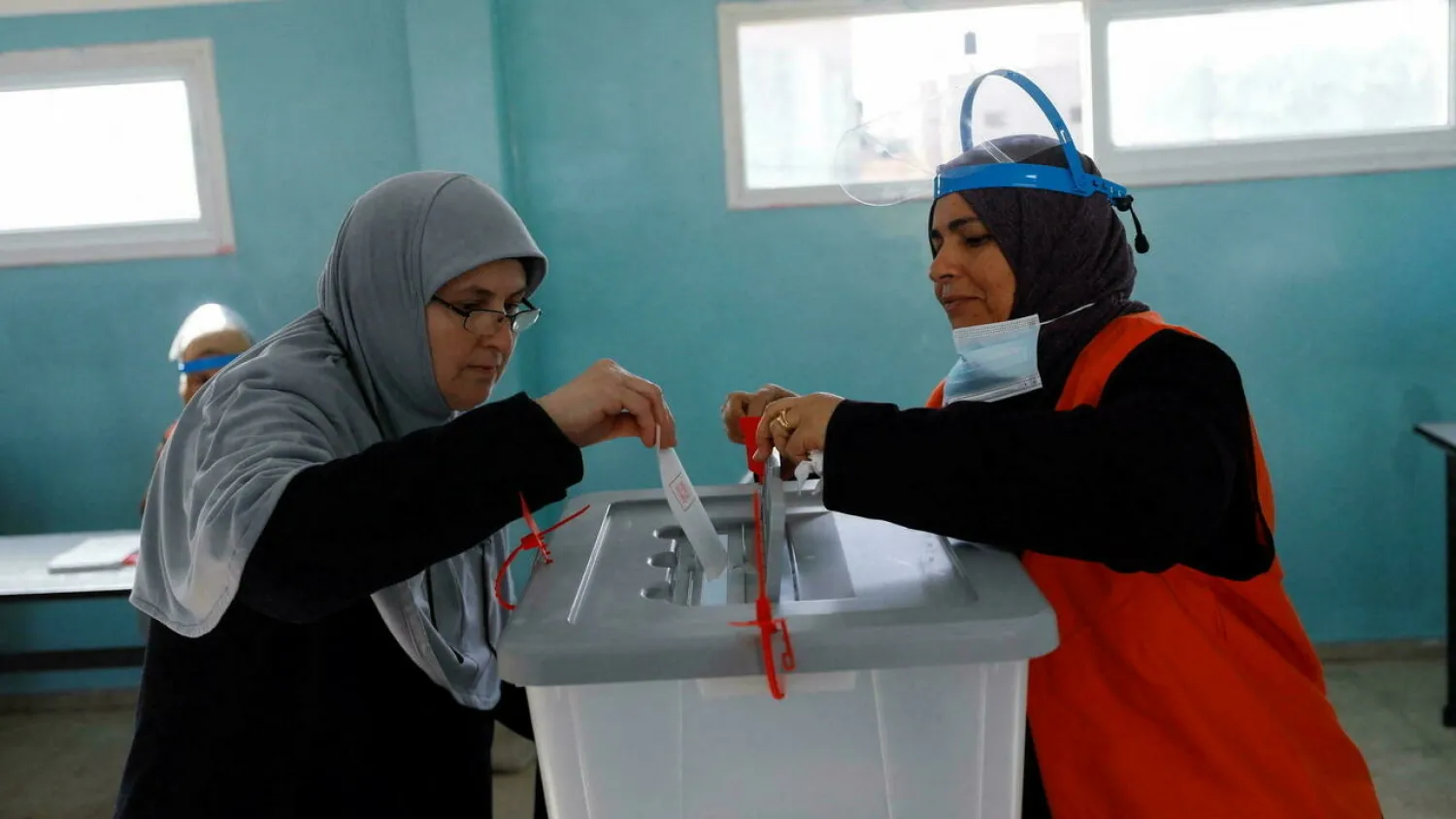 A Palestinian casts his ballot to vote in the municipal elections, near Jenin in the Israeli-occupied West Bank, December 11, 2021. Mohamad Torokman, Reuters
