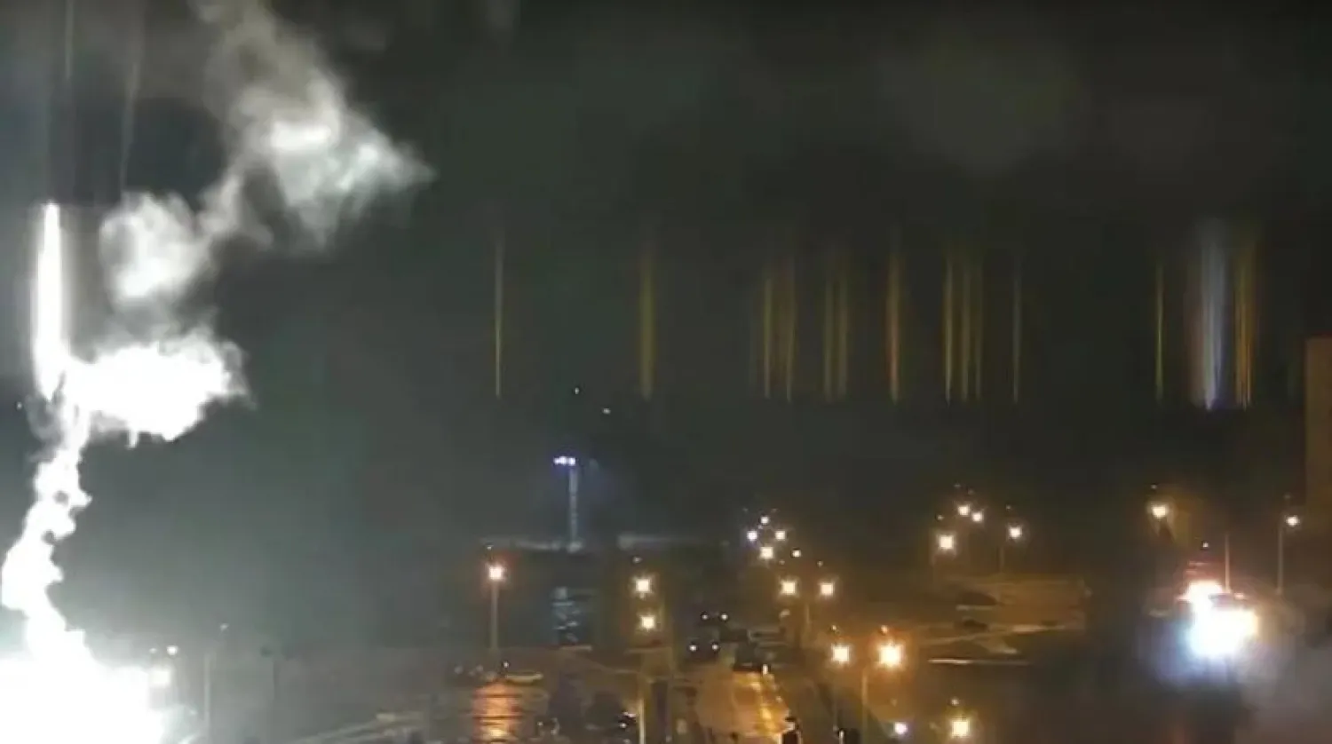 Surveillance camera footage shows a flare landing at the Zaporizhzhia nuclear power plant during shelling in Enerhodar, Zaporizhia Oblast, Ukraine March 4, 2022, in this screengrab from a video obtained from social media. (photo credit: ZAPORIZHZHYA NPP VIA YOUTUBE/VIA REUTERS)
