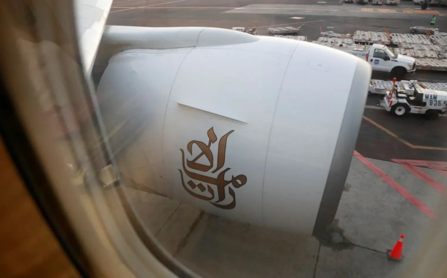 The Emirates logo is seen on an Emirates Airline Boeing 777-200LR plane following its arrival at Mexico City International Airport during its first route from Dubai via Barcelona to Mexico City, Mexico, December 9, 2019. REUTERS/Henry Romero

