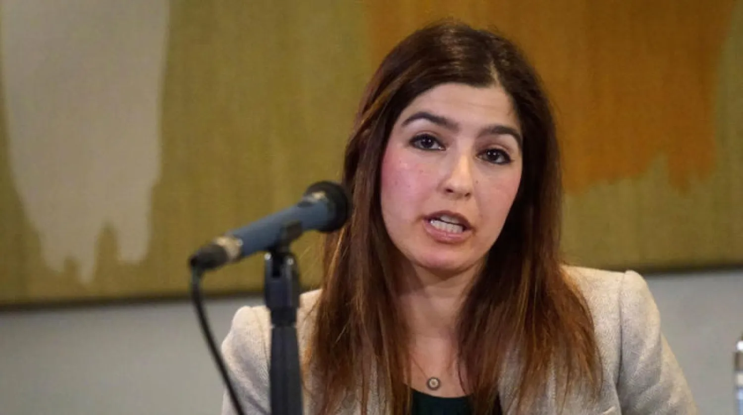 روكسان ابنة مراد طاهباز تتحدث في مؤتمر صحافي بمجلس العموم البريطاني في 21 مارس الحالي (أ.ب)