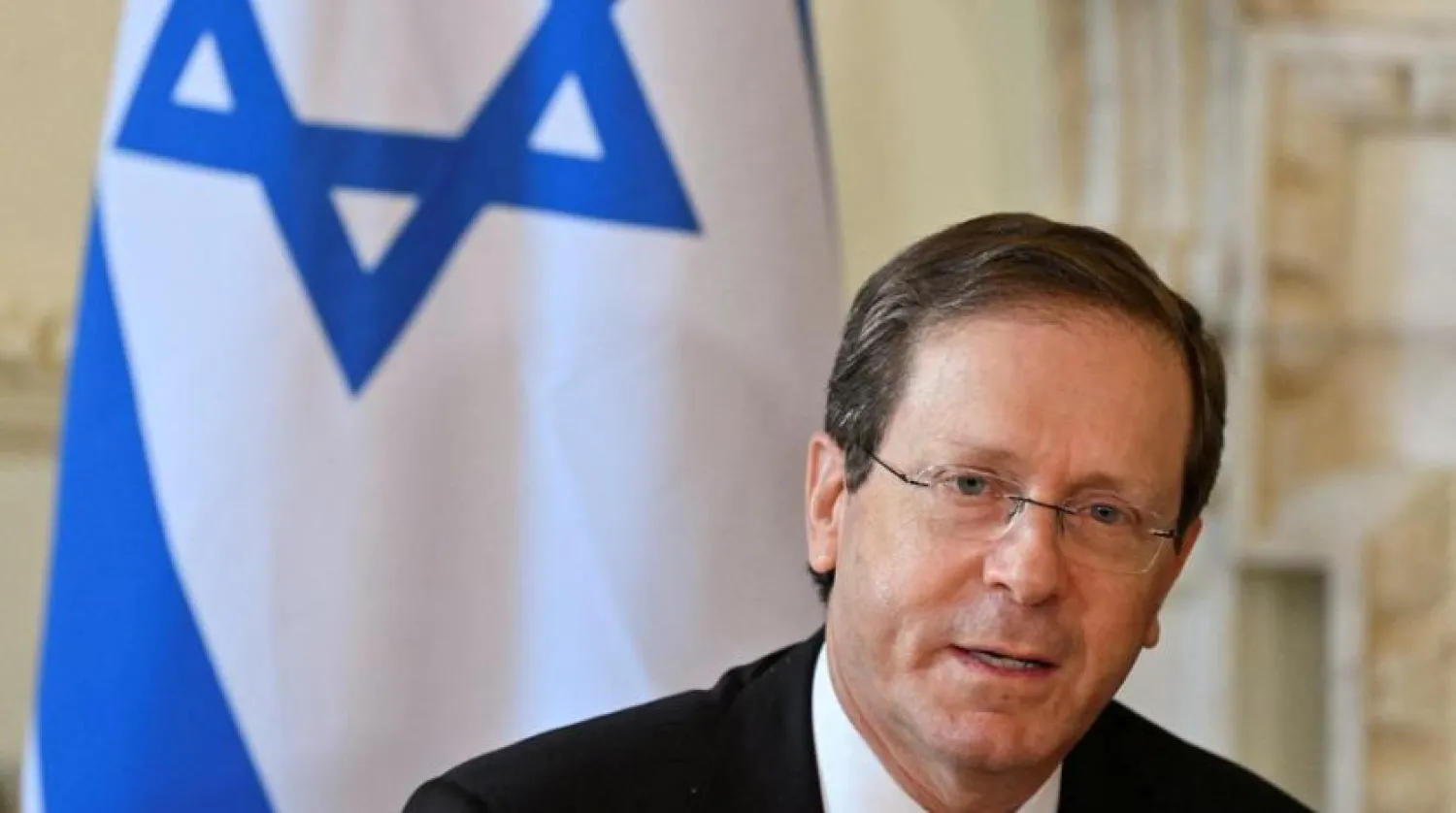Israeli President Isaac Herzog speaks in London, Britain, November 23, 2021. Justin Tallis/Pool via REUTERS
