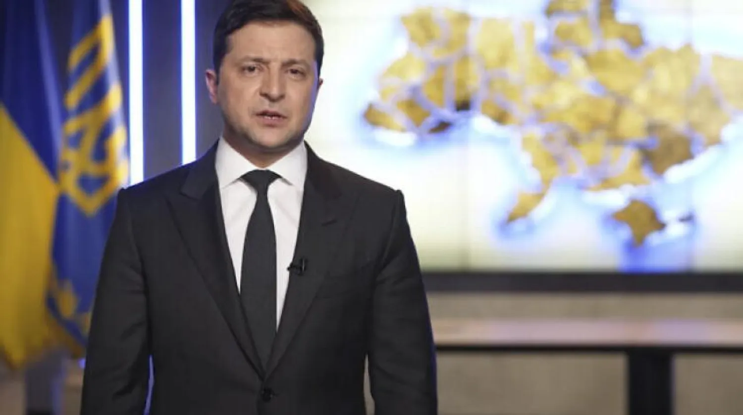 Ukrainian President Volodymyr Zelensky addresses the nation in Kyiv, Ukraine, on February 24, 2022. (Ukrainian Presidential Press Office via AP)
