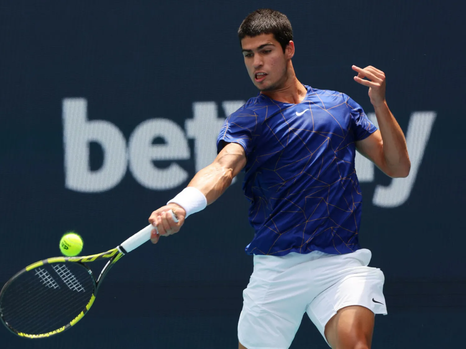 Carlos Alcaraz returns to Casper Ruud during his Miami Open final victory on Sunday Michael Reaves GETTY IMAGES NORTH AMERICA/AFP
