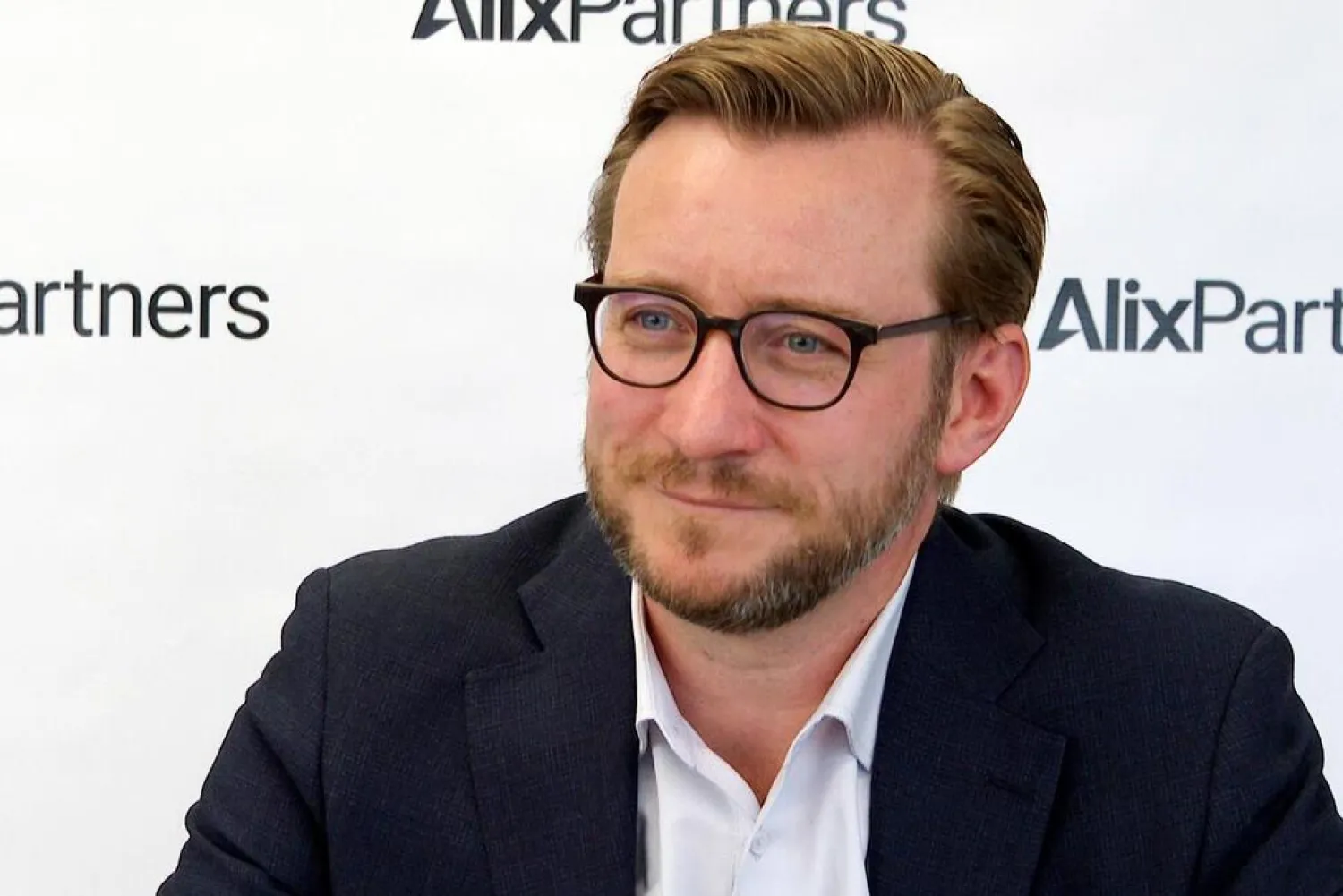 In this Monday, March 21, 2022, image made from video, Mark Wakefield, co-leader of AlixPartners’ global automotive unit, speaks during an interview with The Associated Press at the consulting firm’s offices in Southfield, Mich. Russia’s war on Ukraine is bringing new problems to the global auto industry. (AP)