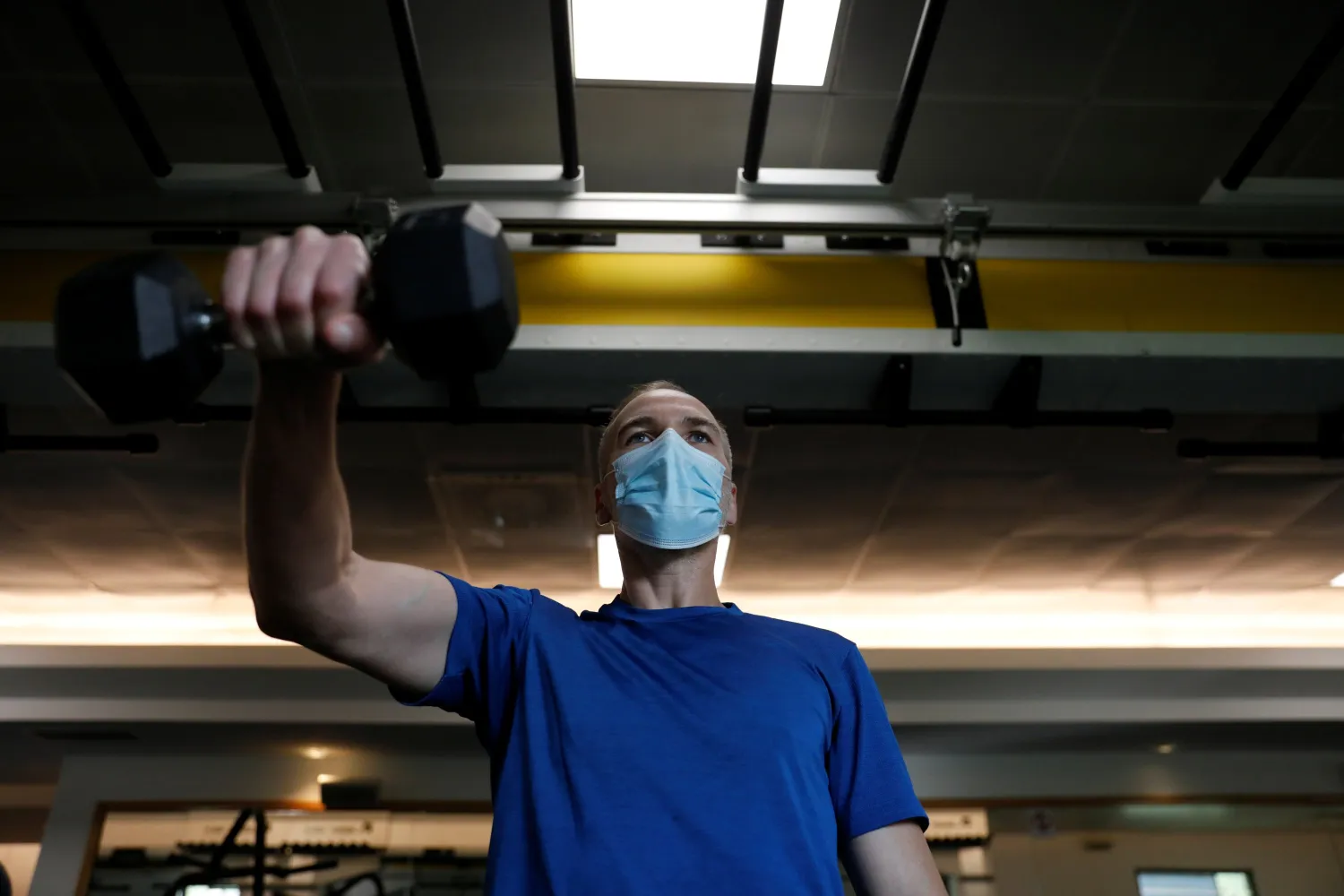 A man trains in a gym on the first day of the reopening of gyms
after a countrywide lockdown, amid the coronavirus disease (COVID-19)
pandemic, Lisbon, Portugal, April 5, 2021. (REUTERS Photo)