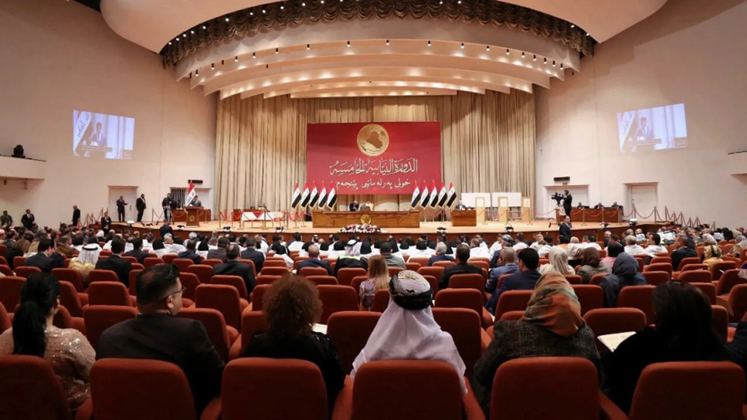 Iraqi lawmakers attending the inaugural session of the parliament in Baghdad, January 9 2022. (Iraqi Prime Minister's Press Office/AFP)