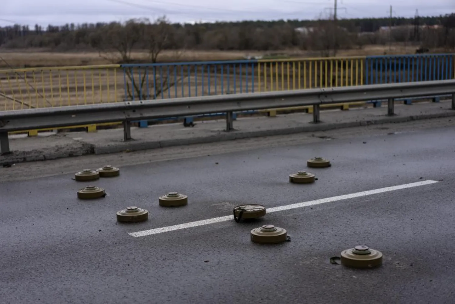Anti tank mines are displayed on a bridge in Bucha, in the outskirts of Kyiv, Ukraine, Saturday, April 2, 2022. (AP)
