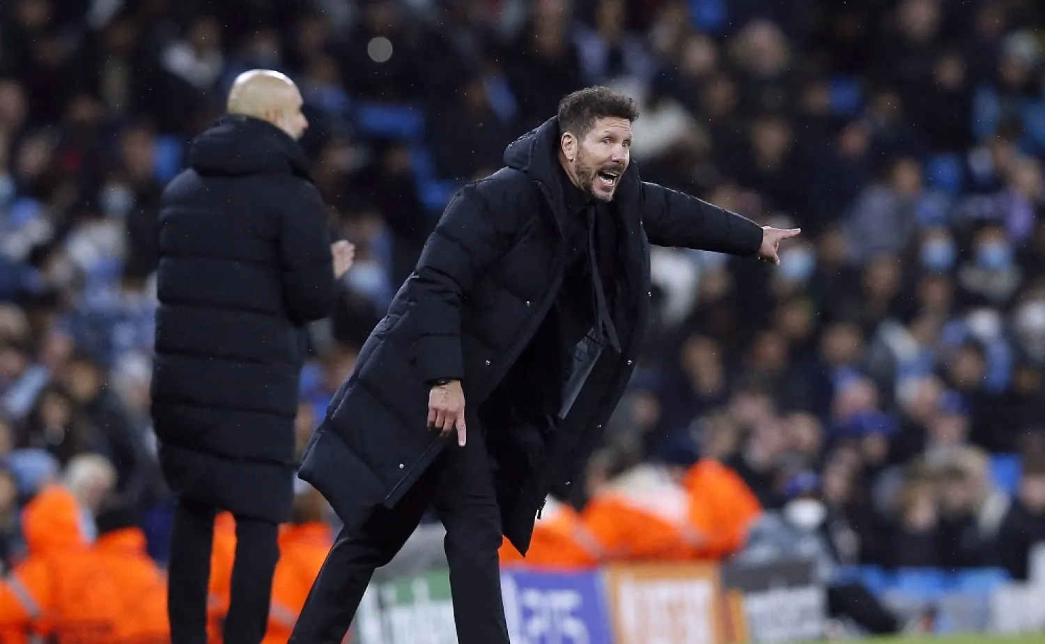 Football - Champions League - Quarter-Final - First Leg - Manchester City v Atletico Madrid - Etihad Stadium, Manchester, Britain - April 5, 2022 Atletico Madrid coach Diego Simeone reacts as Manchester City manager Pep Guardiola looks on (Reuters)