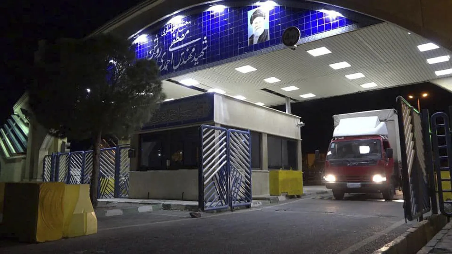 In this photo released on Nov. 6, 2019, by the Atomic Energy Organization of Iran, a truck carrying uranium hexafluoride gas leaves the Ahmadi Roshan uranium enrichment facility in Natanz, Iran, to the centrifuges at the Fordo nuclear facility. (AP)