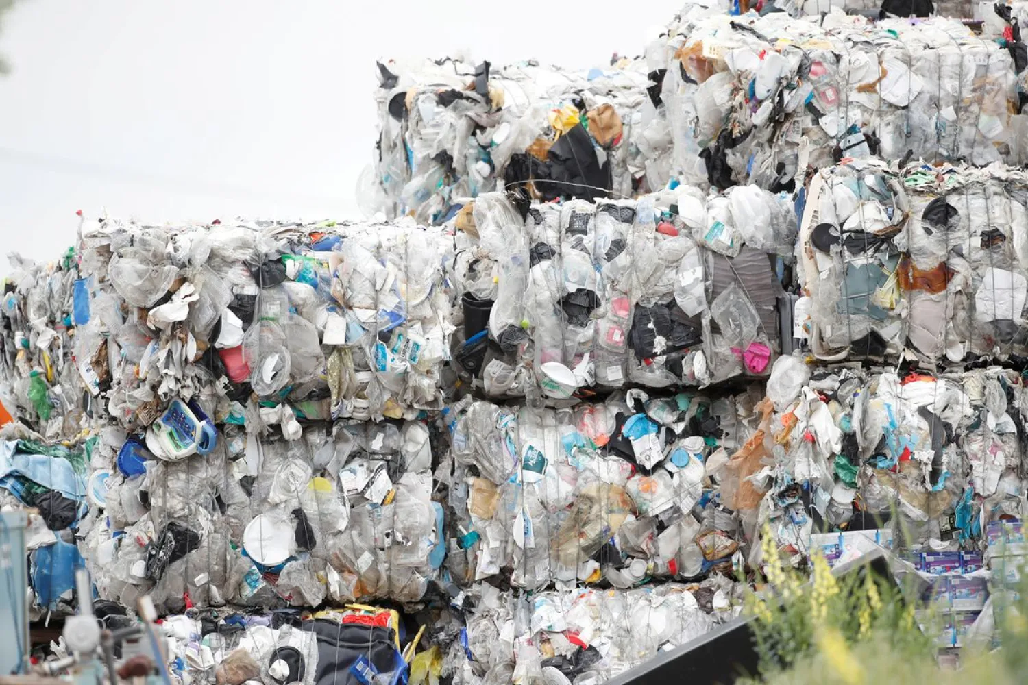 Bales of hard-to-recycle plastic waste are seen piled up at Renewlogy Technologies in Salt Lake City, Utah, US, on May 17, 2021. (Reuters)